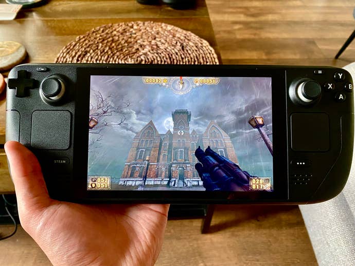 A steam deck displaying Painkiller: Black Edition. The game shows a creepy mansion.