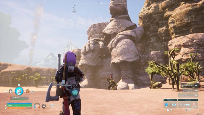 The player looks at Anubis in front of a huge statue of Anubis in Palworld