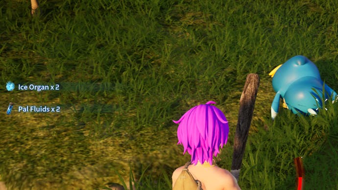 A person with pink hair is holding a wooden bat while facing an unconcious pengullet.