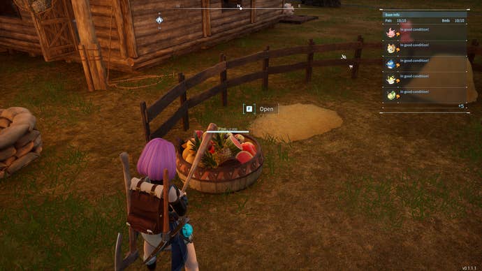 The player looks at a Feed Box inside a Ranch at their base in Palworld