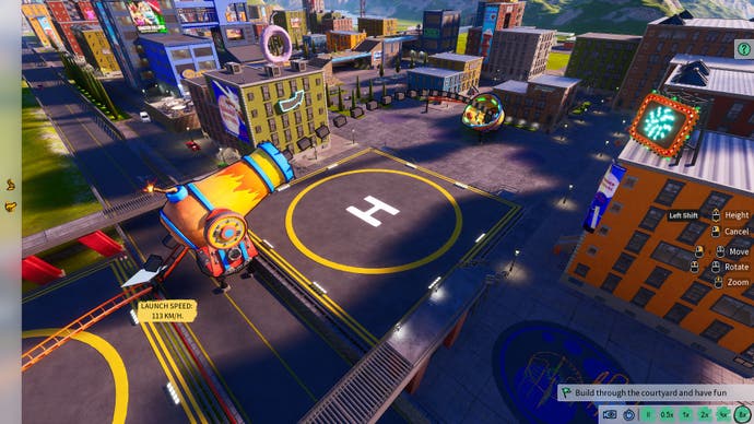 Screenshot of Park Beyond, showing a cannon being aimed over a helipad