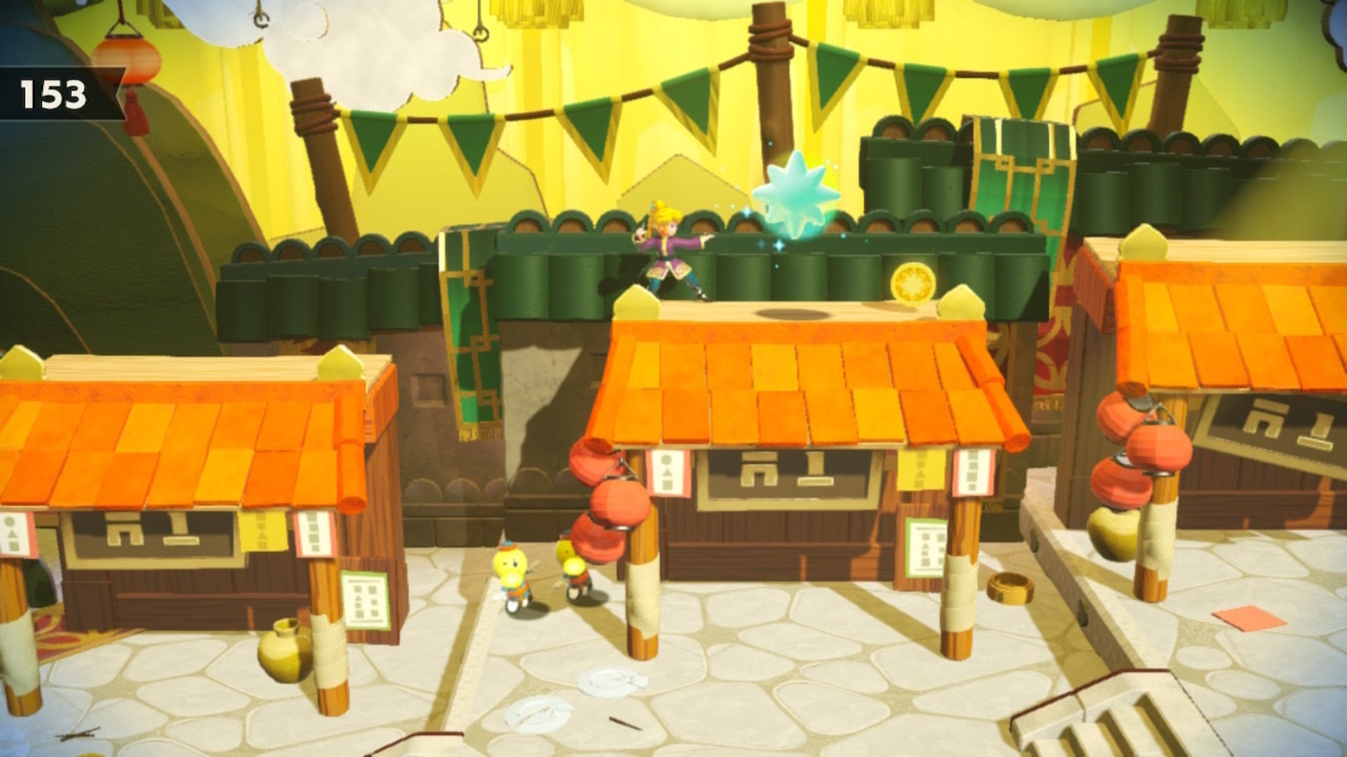 Kung Fu Peach stands atop a small shack with a Sparkle Gem to her right in Princess Peach: Showtime