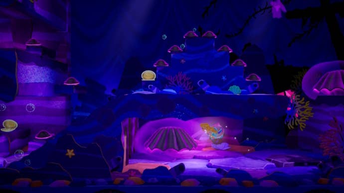 Mermaid Peach approaches a purple clam in Princess Peach: Showtime
