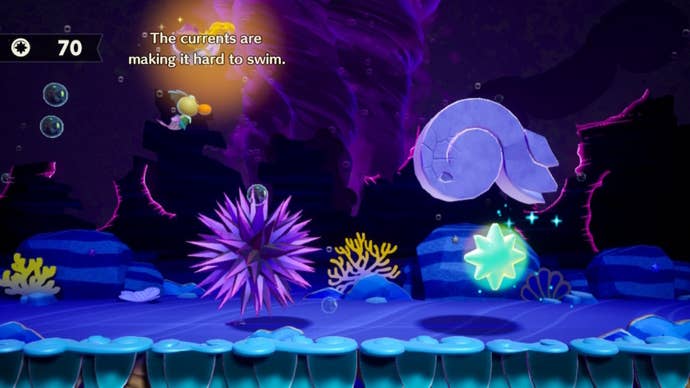 Mermaid Peach swims past various debris and a Sparkle Gem with Mermaid Sparkla in Princess Peach: Showtime
