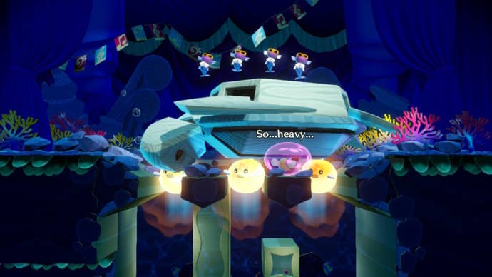 Mermaid Peach controls three puffer fish to try and lift a large sea turtle in Princess Peach: Showtime