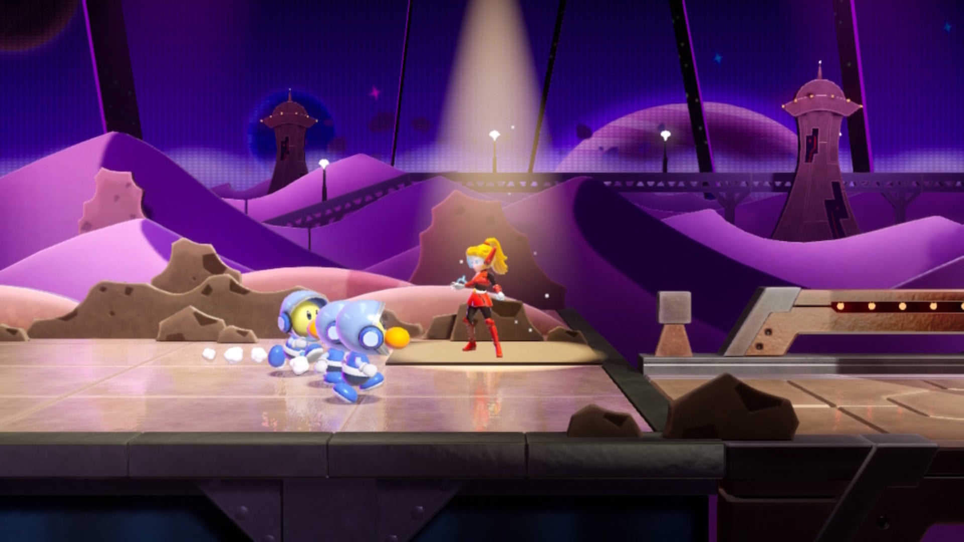 Mighty Peach stands atop a spotlight on an alien planet in Princess Peach: Showtime