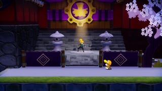 Ninja Peach stands atop a spotlight in front of a door in Princess Peach: Showtime