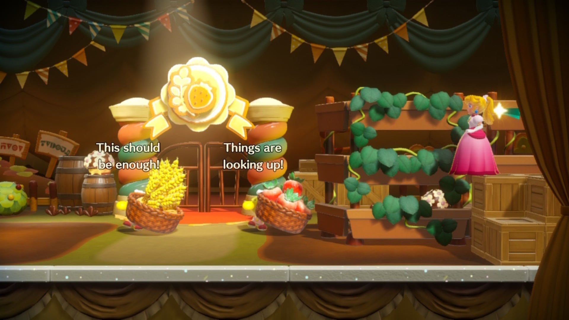 Peach stands on some boxes in a farm area where a Sparkle Gem can be found in Princess Peach: Showtime