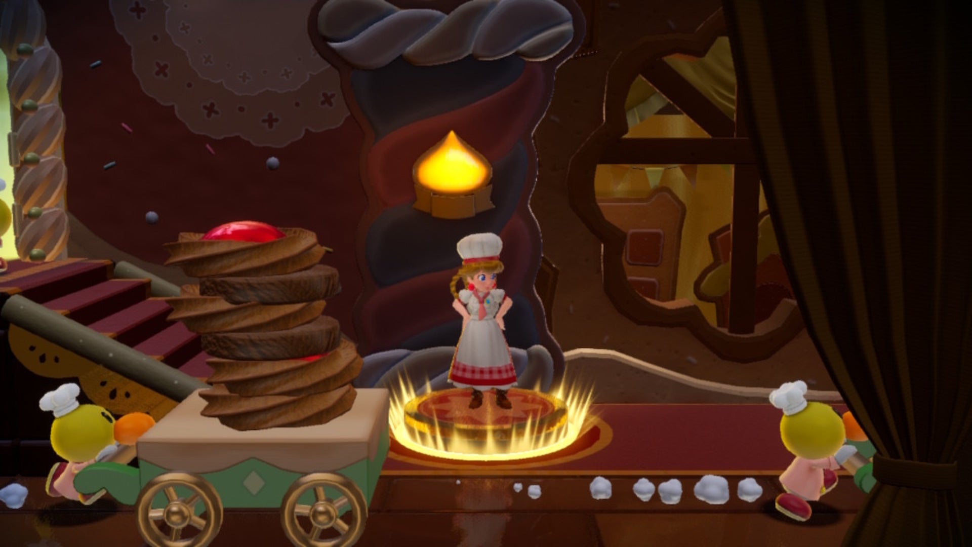 Peach stands on a spotlight beside come cookies in Princess Peach: Showtime - 7