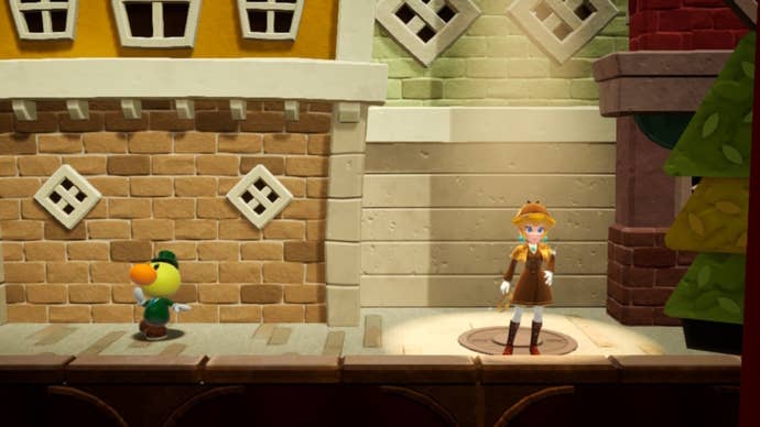 Detective Peach stands atop a spotlight, that is on a manhole, in Princess Peach: Showtime
