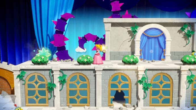 Peach stands by some bushes to the right of a Sparkle Gem in Princess Peach: Showtime