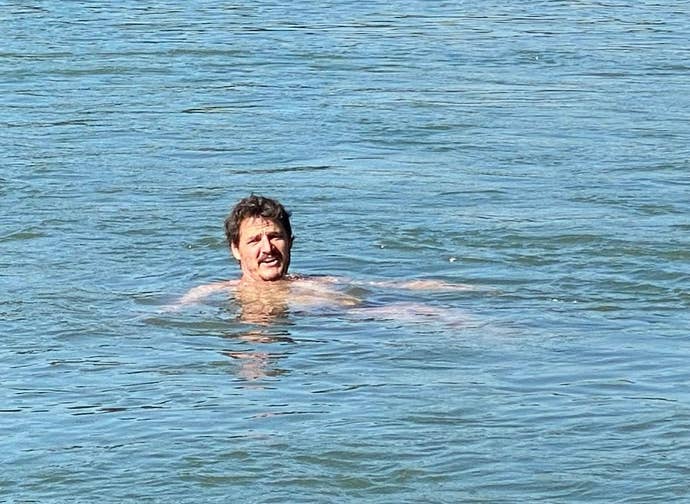 Pedro Pascal floating in the sea