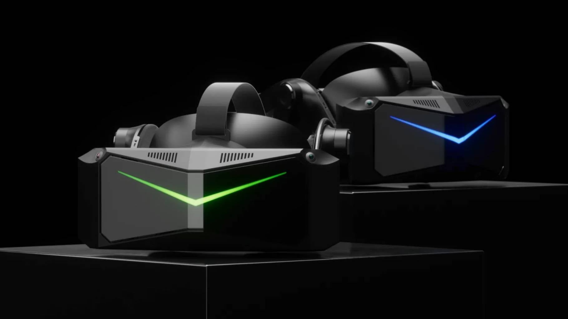 Two Pimax VR headsets against a dark background.