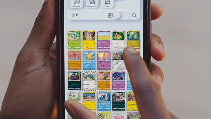 Pokemon Trading Card Game Pocket showing collection of cards held on a mobile screen