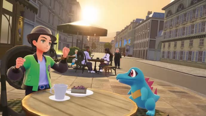 Pokémon Legends Z-A screenshot showing its male hero at a café table with Totodile.