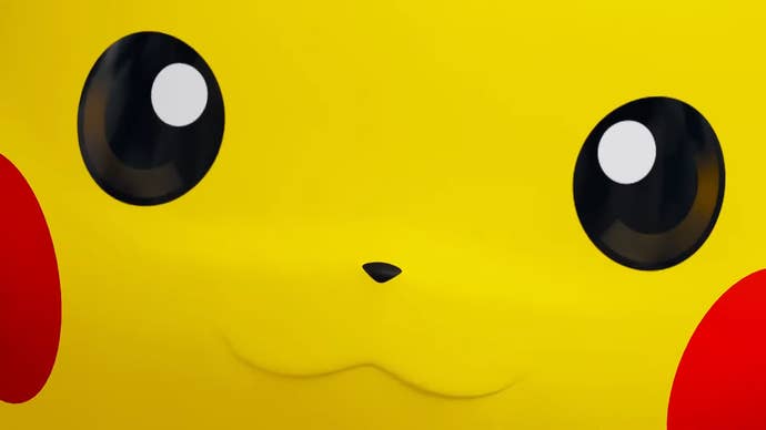Extreme close-up of Pikachu’s big bright yellow face with red cheeks