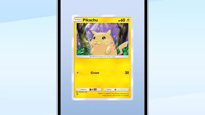 A Pikachu card in Pokemon TCG Pocket is shown on a mobile phone screen