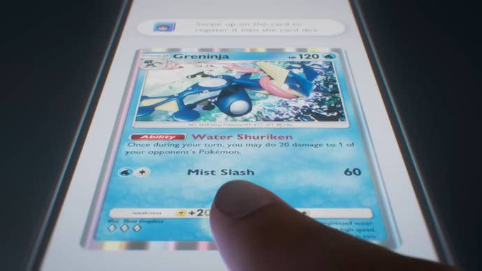 Pokemon Trading Card Game Pocket trailer screenshot showing mobile screen with Greninja card and a finger poking the screen