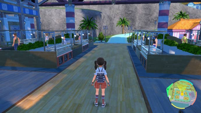 The player stands in the Auction House in Port Marinada of Pokemon Scarlet and Violet