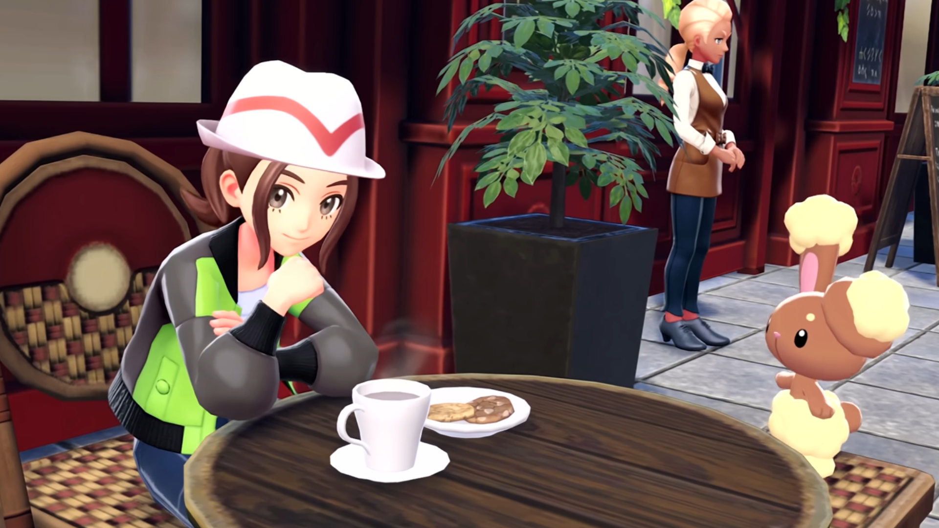 Pokémon Legends: Z-A screenshot showing female player character sat drinking coffee with a cute bunny pokémon