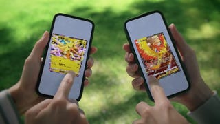 Screenshot from Pokemon TCG Pocket trailer showing two mobile phones being held with Zapdos and Moltres cards
