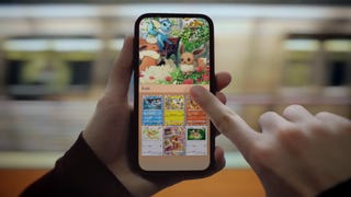 Pokémon TCG Pocket trailer screenshot showing finger pointing at mobile screen with Eeveelutions