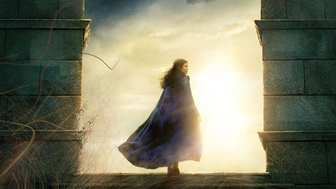 Image of a woman standing in silhouette between two pillars