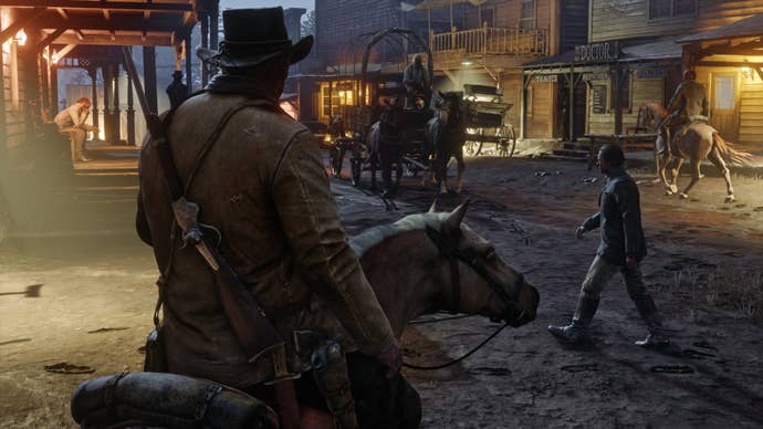 Arthur rides his horse in one of Red Dead Redemption 2’s small towns