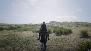 Arthur can be seen on horseback in the middle of the wilderness in Red Dead Redemption 2