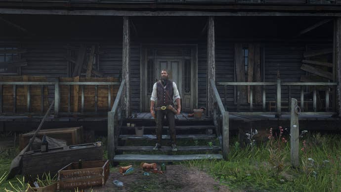 Arthur Morgan stands outside of Jeremiah Compson’s house in Red Dead Redemption 2