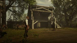 Arthur stands beside the professor while he inspects the gallows of Saint Denis in Red Dead Redemption 2