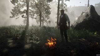 Arthur Morgan stands beside a campfire in a forest in Red Dead Redemption 2
