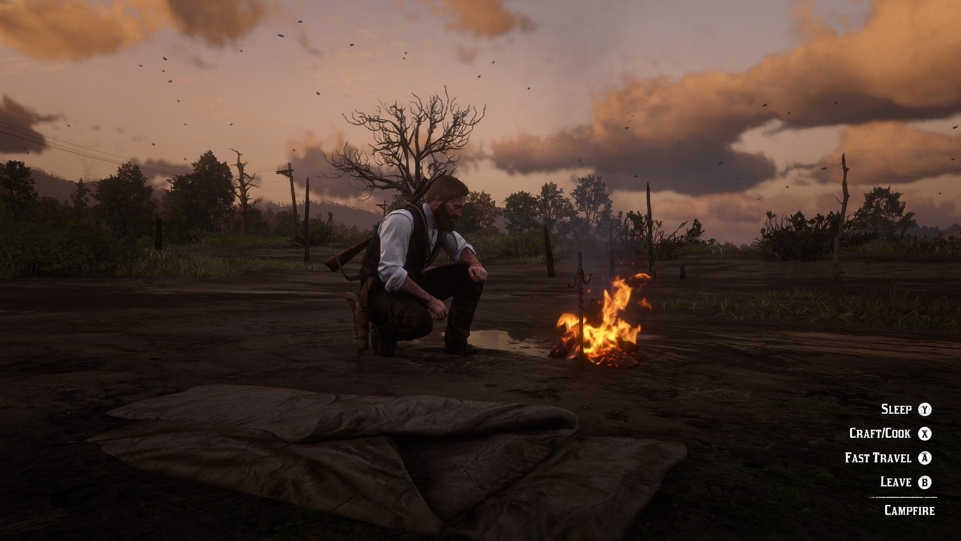 Arthur sets up a camp in the wilderness to rest and craft at in Red Dead Redemption 2 - 1