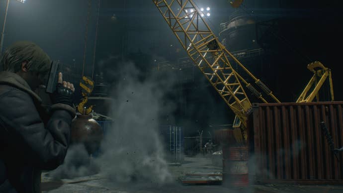 Leon looks over at a crane powered by Ashley in Resident Evil 4 Remake