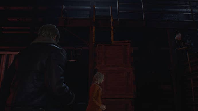Leon faces a ladder with Ashley in front of it in Resident Evil 4 Remake