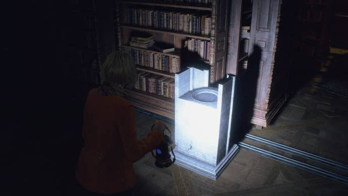 Ashley faces a pedestal for her lantern in the library of Resident Evil 4 Remake