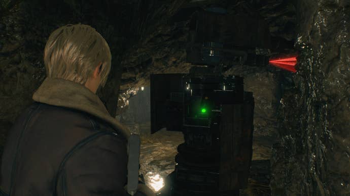 Leon looks at a movable laser gate in Resident Evil 4 Remake