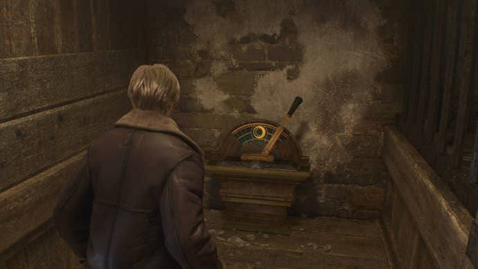 Leon looks at a lever in Resident Evil 4 Remake