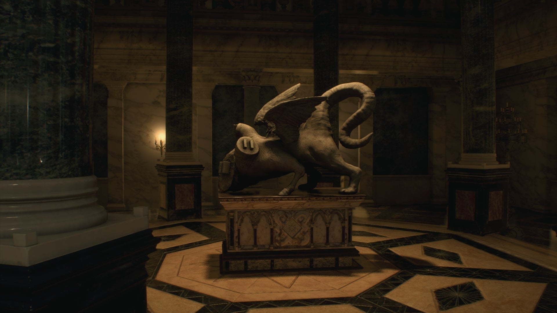 A three-headed statue that is missing the head is shown in Resident Evil 4 Remake - 4