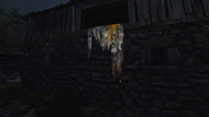 A ledge by the barn in Resident Evil 4 Remake, which Ashley can climb up