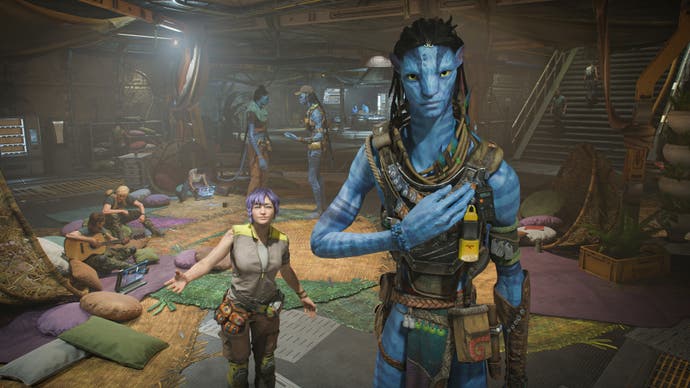 Inside a resistance camp in the new Avatar game, where two characters - a tall blue Na'vi, and a smaller human, who's barely chest-high to the Na'vi - greet us.