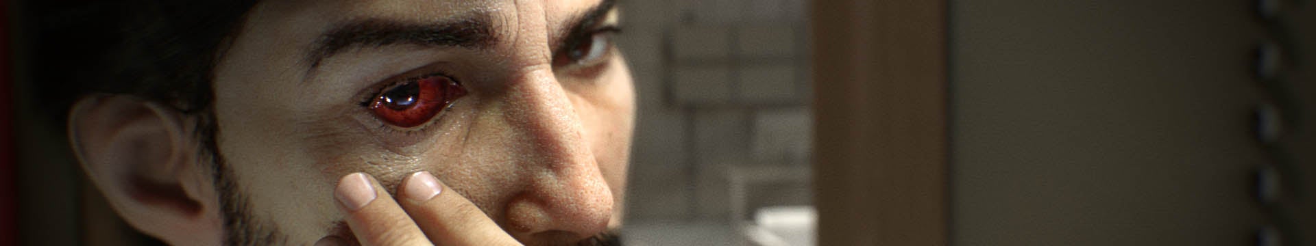 A shot of Morgan inspecting his eye in Prey - 69