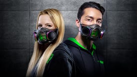 A man and woman modelling the Razer Zephyr face mask,