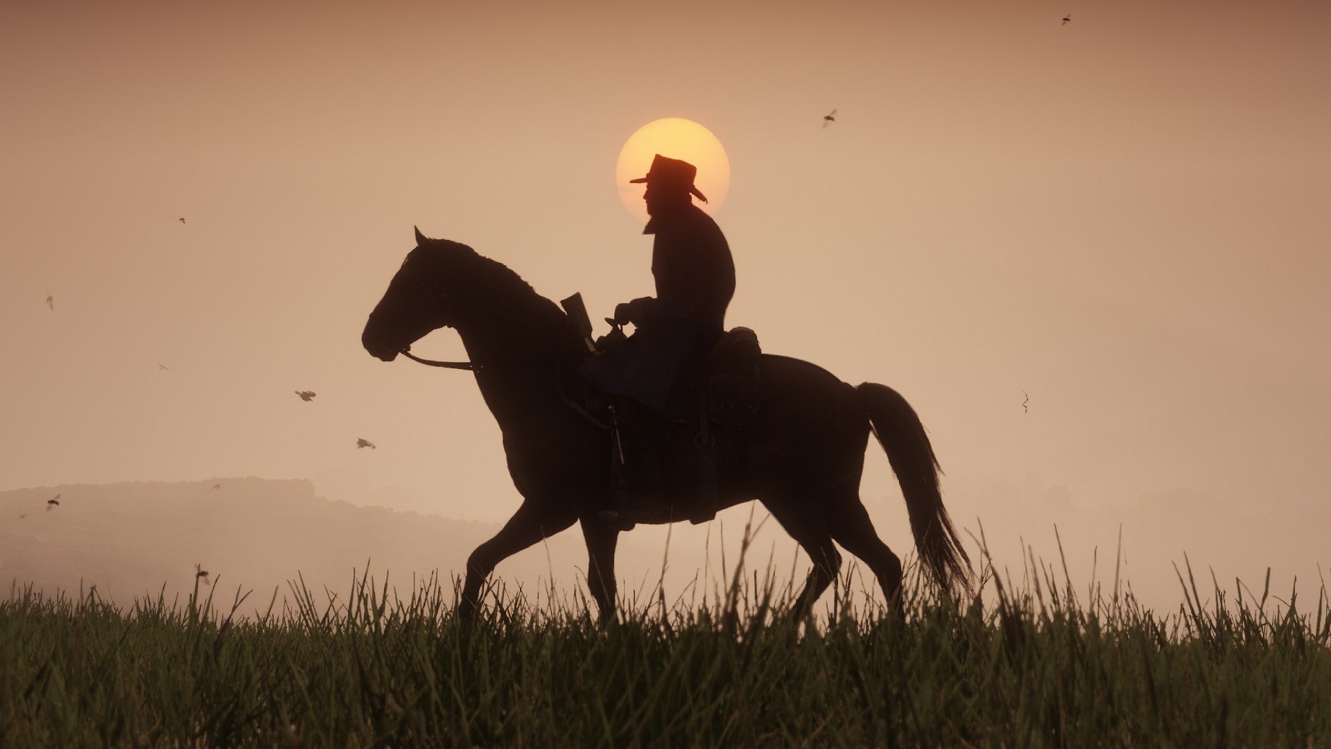 Red Dead Redemption 2 image showing a silhouette of Arthur Morgan riding across a field at sunset. - 7