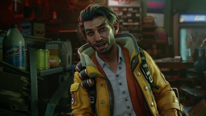 Redfall image showing Devinder talking at the camera, wearing a yellow jacket.