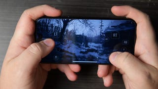 resident evil village running on iPhone 15 Pro, shown using the touch screen controls