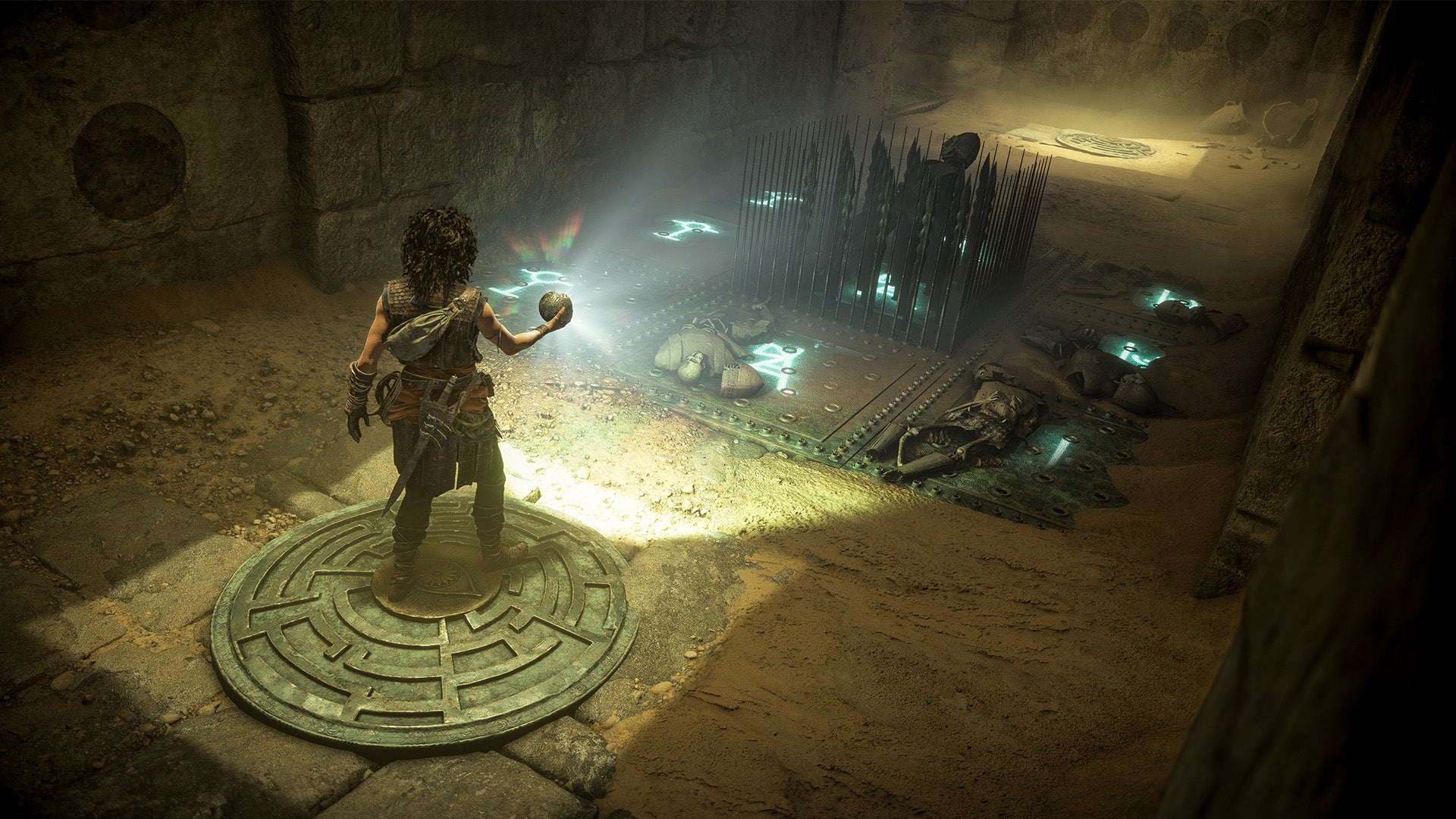 A dark curly haired woman holds a ball that emits light onto a spike trap before her. It's Sophia in Resonance: A Plague Tale Legacy.