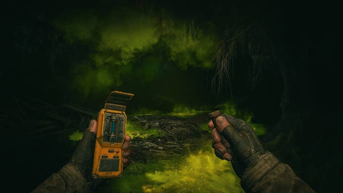 A player explores an irradiated toxic cave in Stalker 2