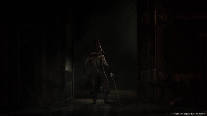 The back of Pyramid Head is seen exiting the apartments after a siren starts blaring in the Silent Hill 2 remake