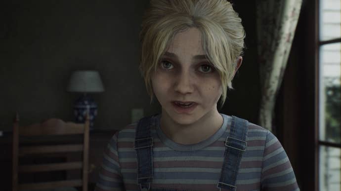 A screenshot from Silent Hill 2 Remake: A young girl with blonde hair looks directly into the camera, eyes wide.